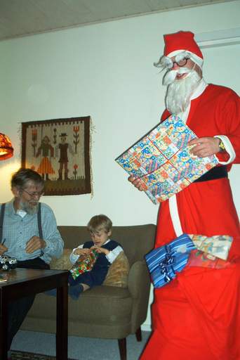 Santa and Grandpa help Joshua 